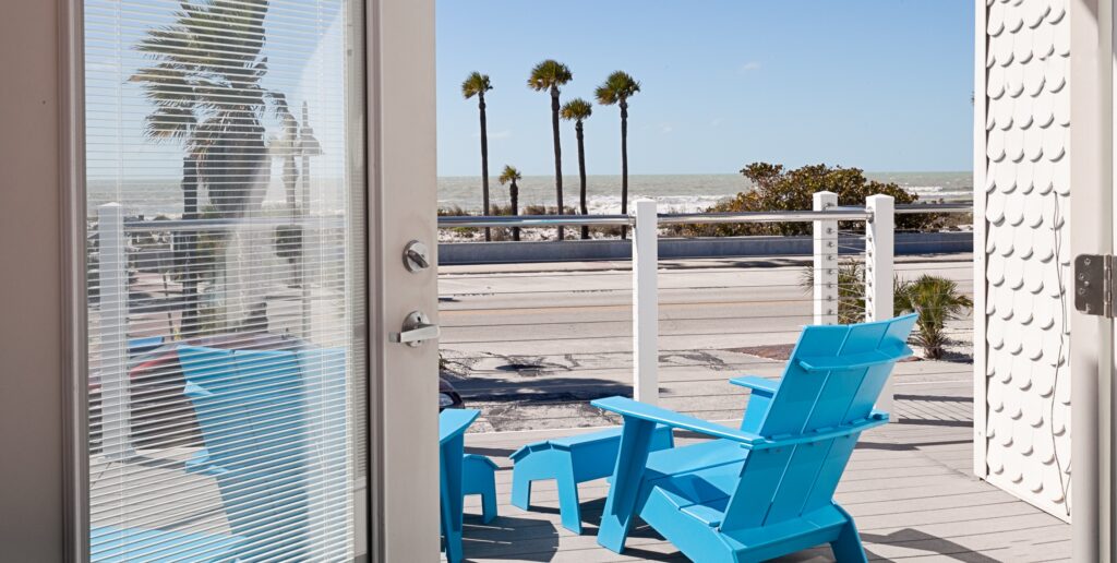 deck with beach & palms for view