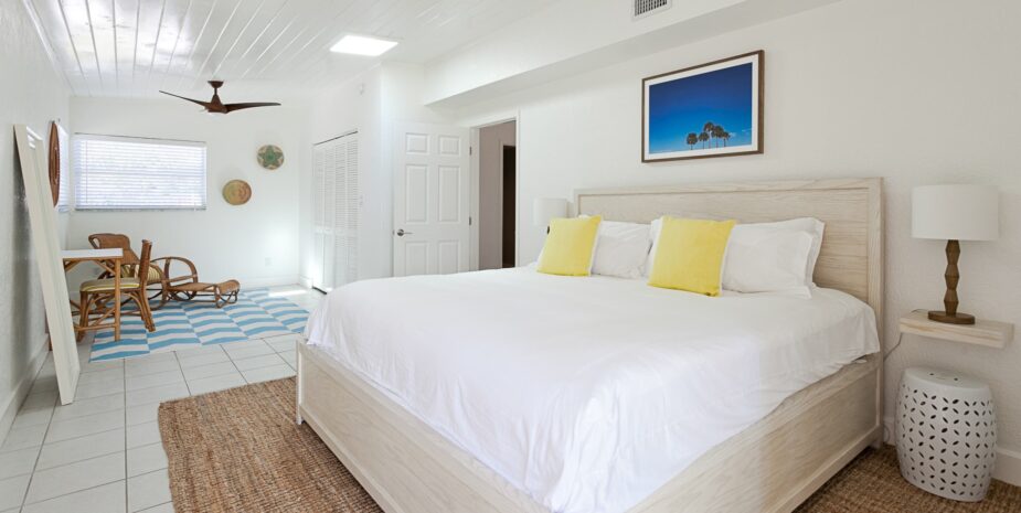 white bedroom with sisal rug
