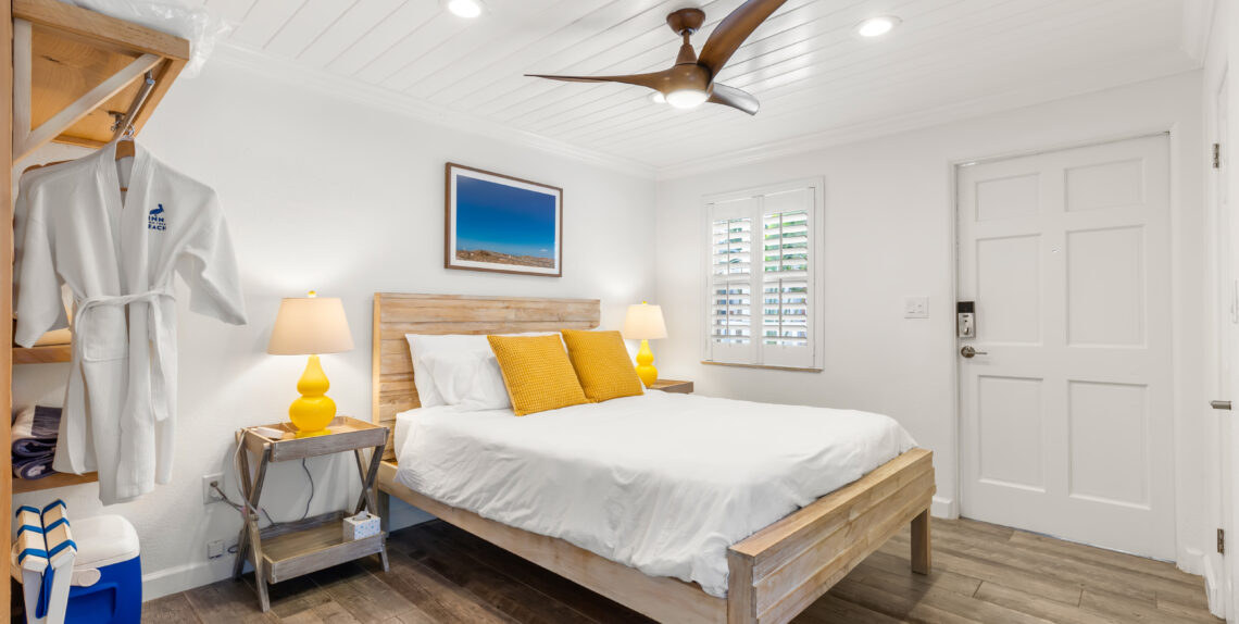 white shiplap ceiling, bed