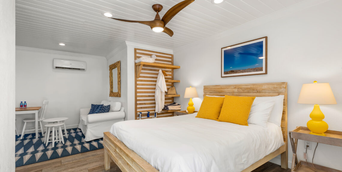 white shiplap ceiling, bed