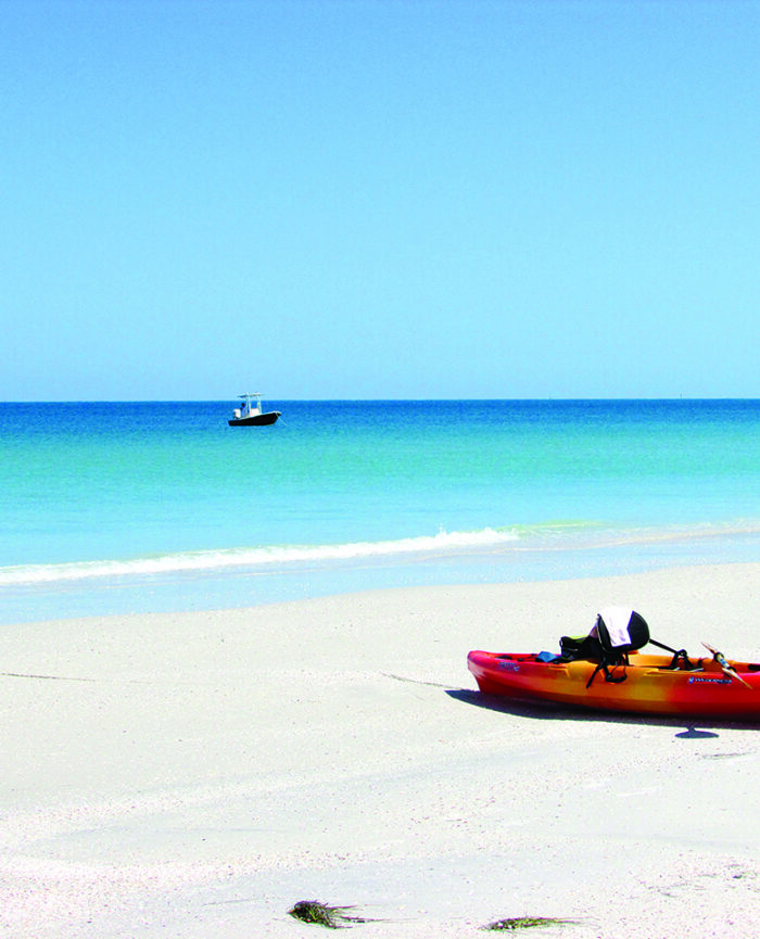 kayak sitting on the beach