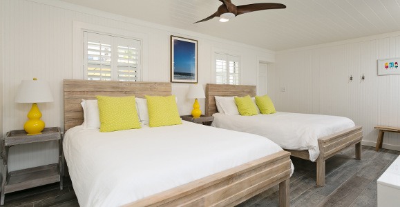 Palmetto room with 2 beds in white w/yellow
