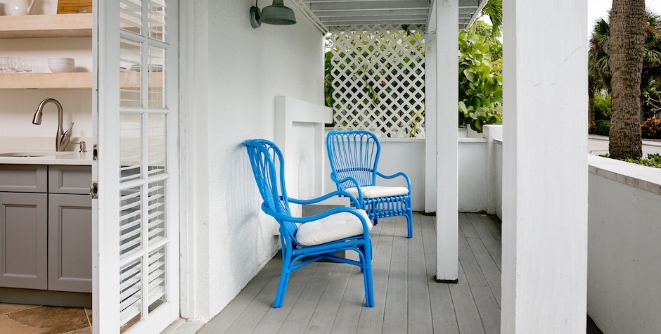 blue & white chairs on grey deck