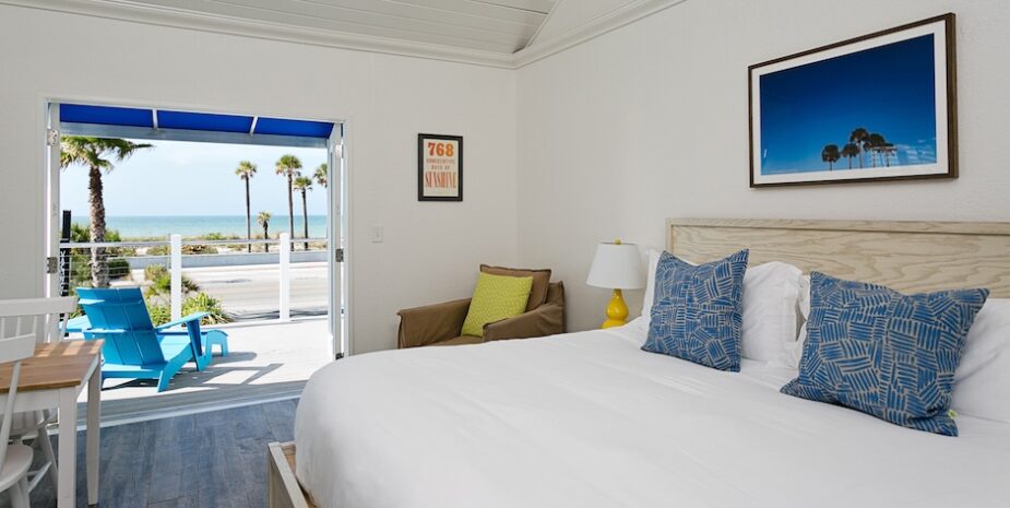 room with beach view and shiplap ceiling